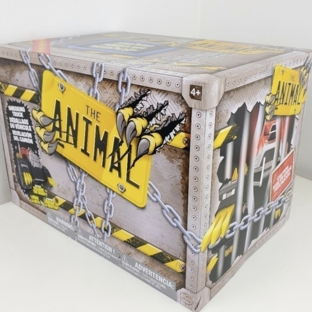 The Animal Unboxing Lights and Sounds Toy Truck - Picture 7 of 13